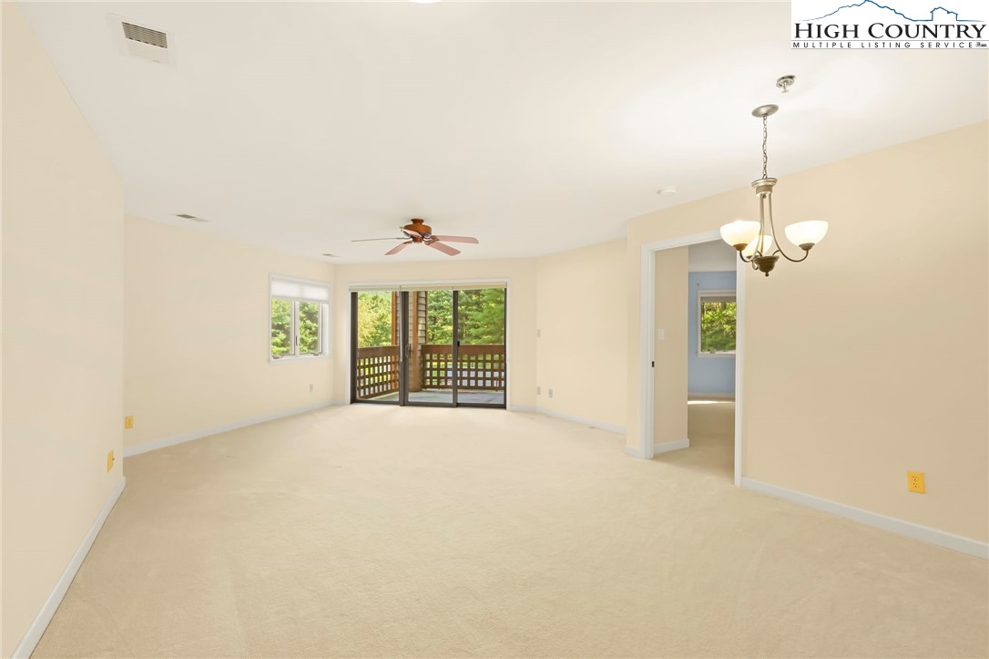 151 Deer Valley Drive, Unit 225 Boone, NC 28607 - Photo 8 of 31 a view of an empty room with a window