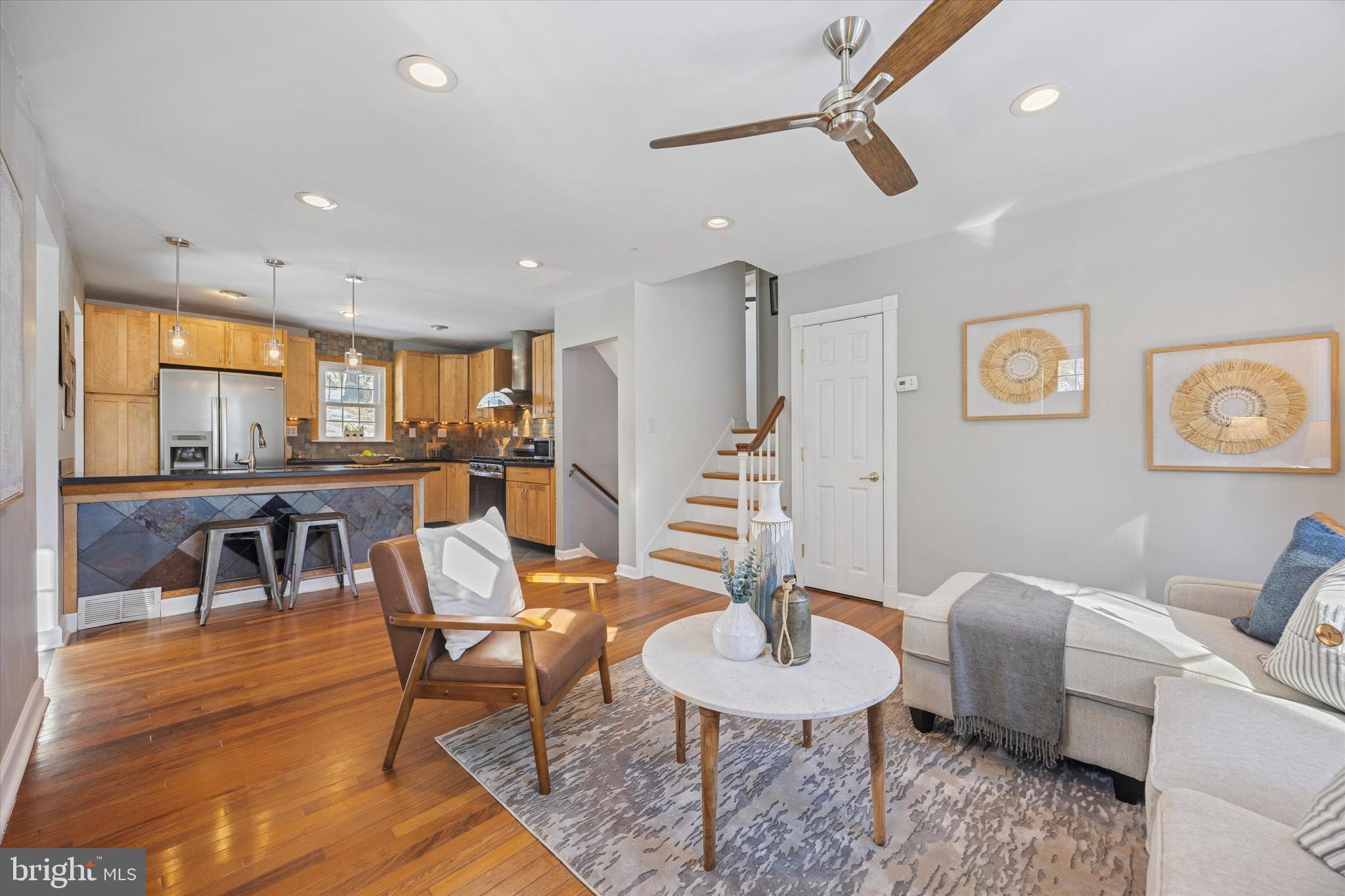 8516 Chippewa Road Philadelphia, PA 19128 - Photo 2 of 20 a living room with furniture a rug and a table