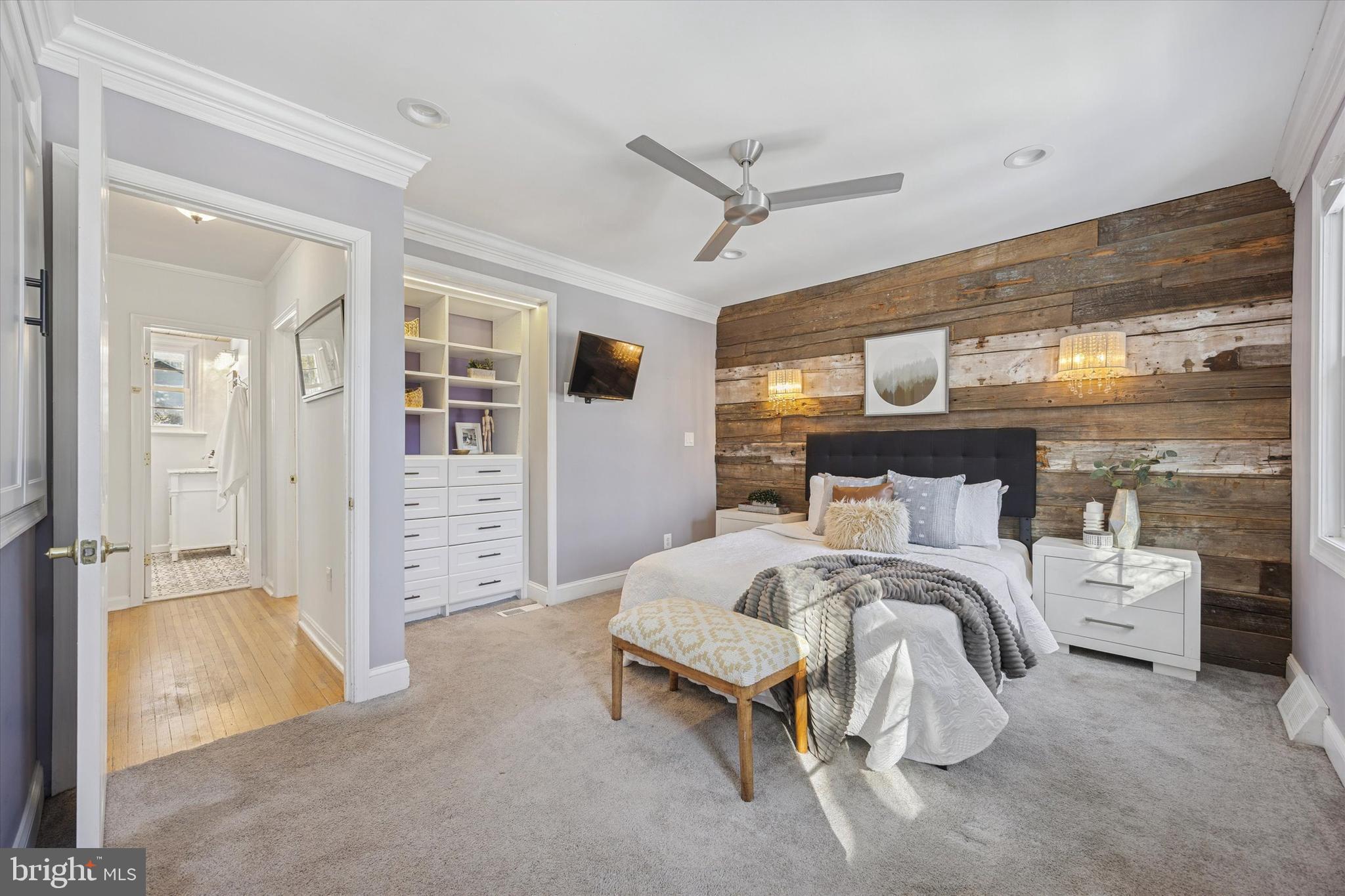 8516 Chippewa Road Philadelphia, PA 19128 - Photo 7 of 20 a bedroom with a bed and a large mirror