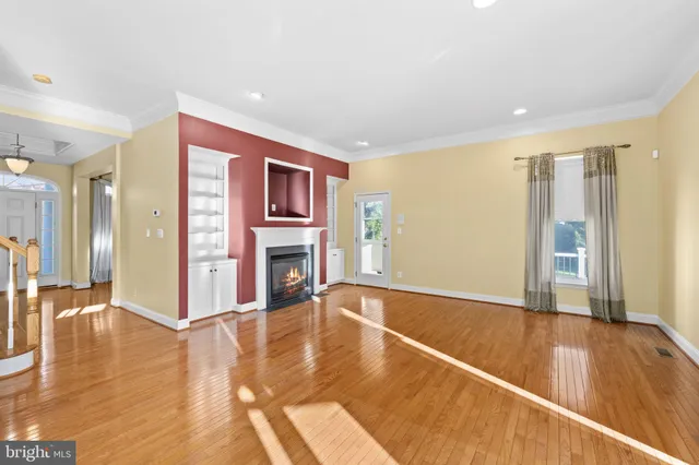 a view of a livingroom with wooden floor