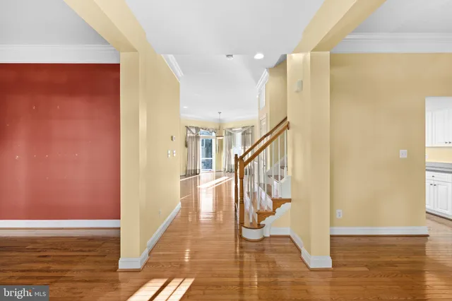 a view of entryway with wooden floor