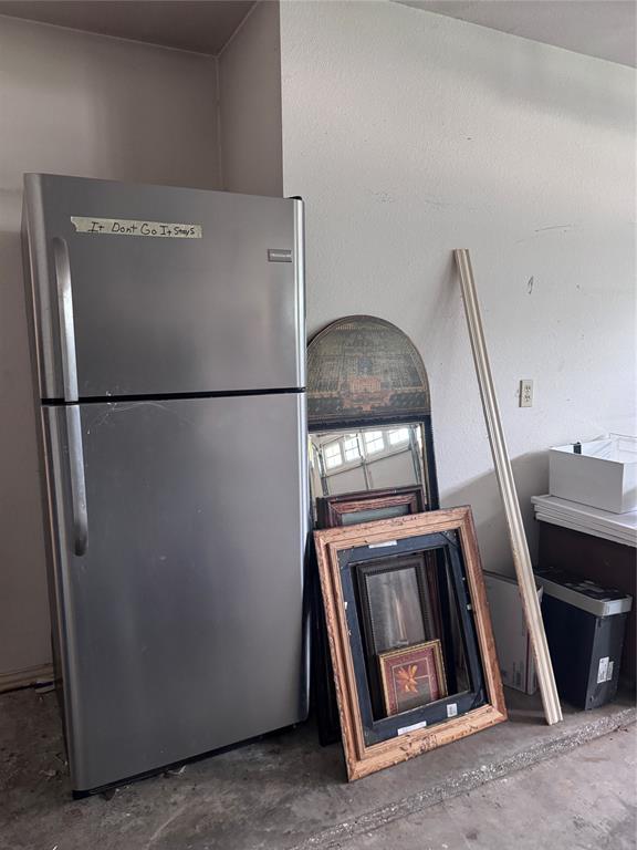 1704 South Bowen Road Pantego, TX 76013 - Photo 32 of 37 Refrigerator in garage provided to tenant