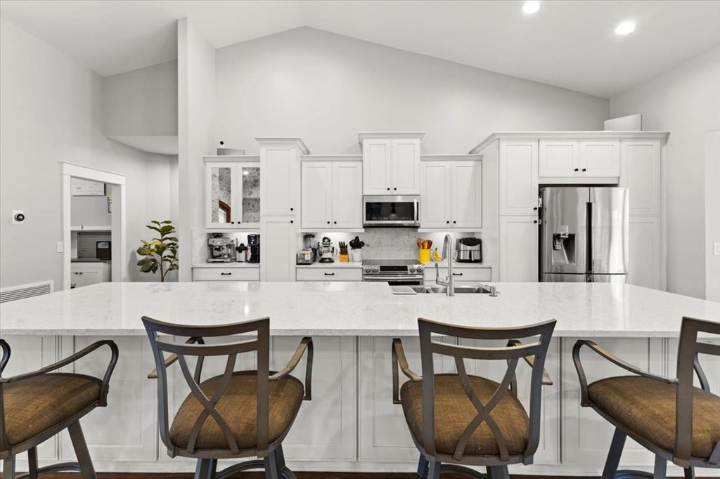 10349 Camelback Lane Boca Raton, FL 33498 - Photo 12 of 38 a view of a dining room with furniture
