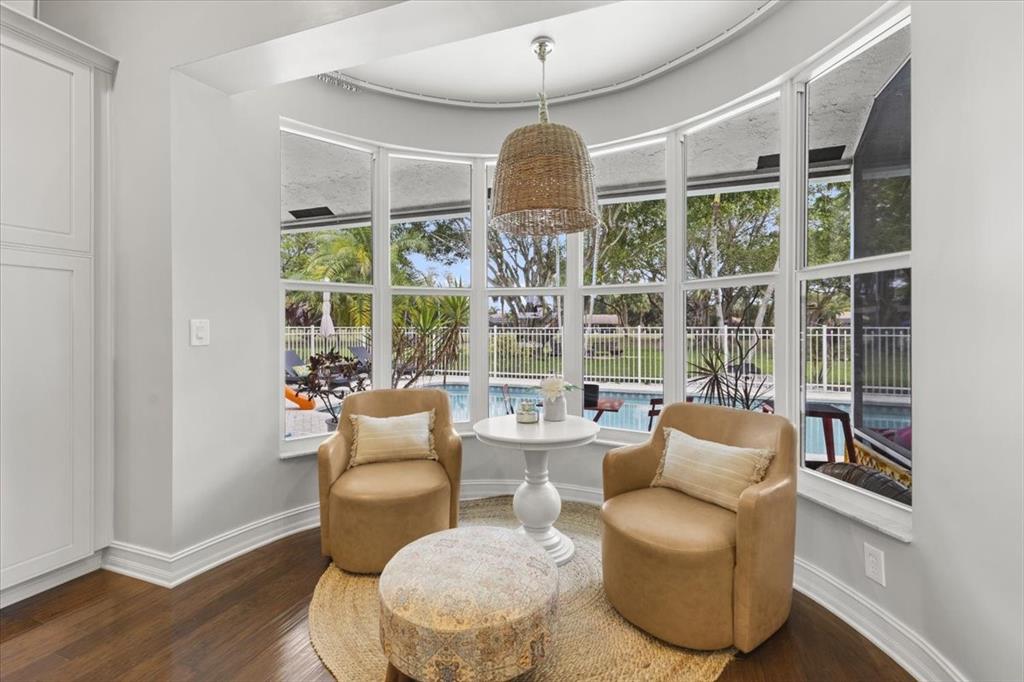 10349 Camelback Lane Boca Raton, FL 33498 - Photo 13 of 38 a living room with furniture and a large window