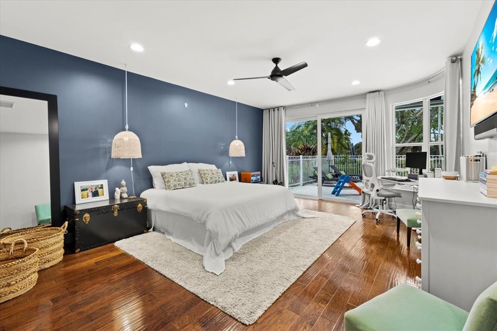 10349 Camelback Lane Boca Raton, FL 33498 - Photo 16 of 38 a bed room with a bed window and a chair