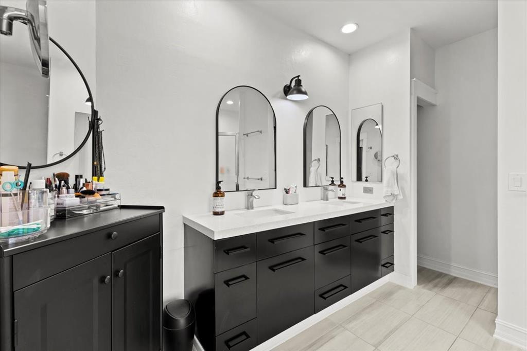 10349 Camelback Lane Boca Raton, FL 33498 - Photo 19 of 38 a bathroom with a double vanity sink and a mirror