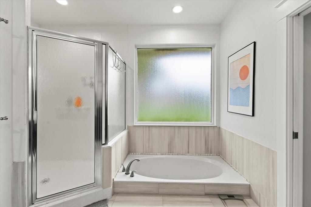 10349 Camelback Lane Boca Raton, FL 33498 - Photo 21 of 38 a bathroom with bathtub and shower