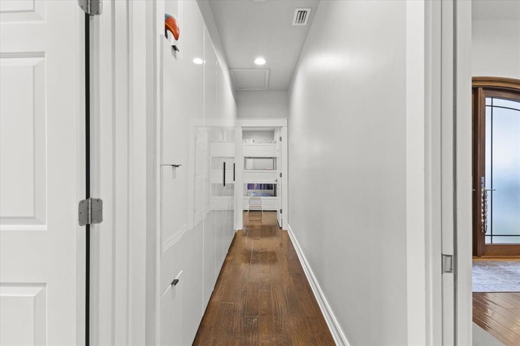 10349 Camelback Lane Boca Raton, FL 33498 - Photo 22 of 38 a view of a hallway with wooden floor and staircase
