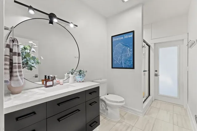 a view of a kitchen from the hallway