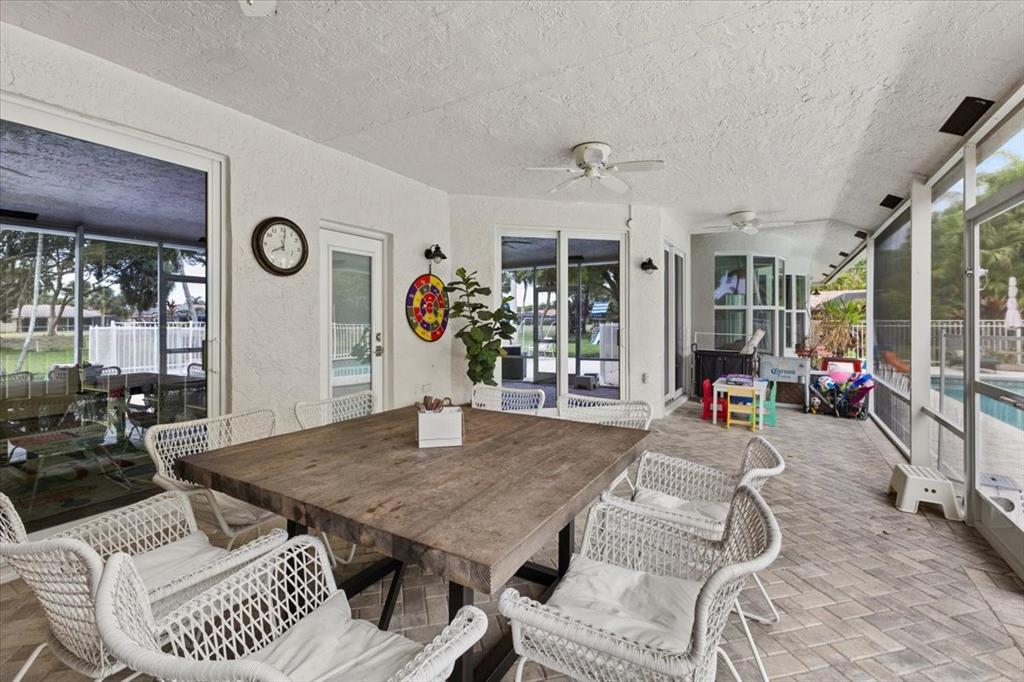 10349 Camelback Lane Boca Raton, FL 33498 - Photo 30 of 38 a view of a dining room with furniture