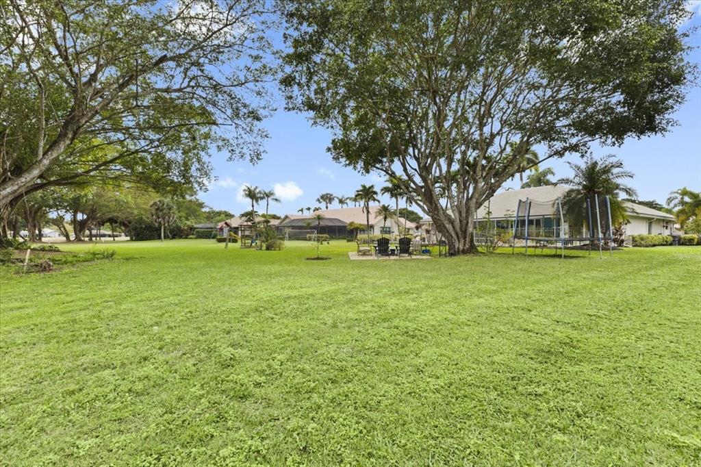 10349 Camelback Lane Boca Raton, FL 33498 - Photo 37 of 38 a view of yard with trees