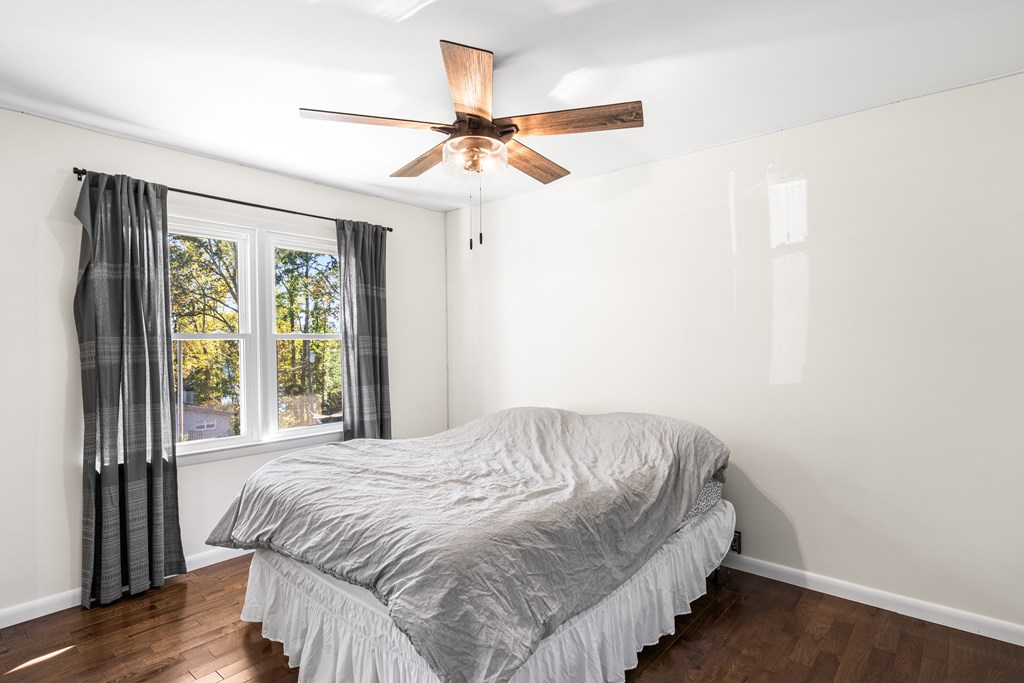128 Cardinal Lane Hayesville, NC 28904 - Photo 25 of 40 a bedroom with a bed and a window