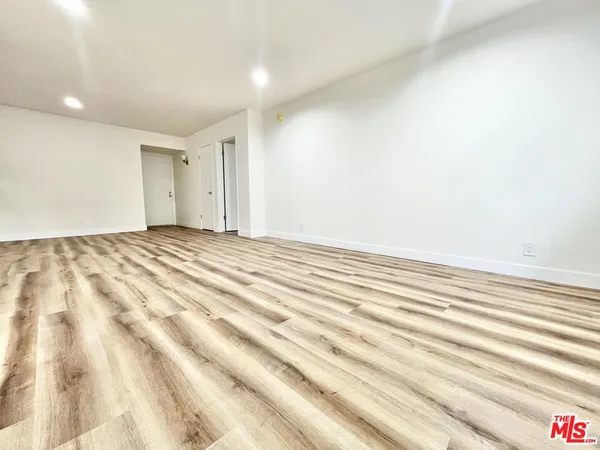 a view of a room with an empty space
