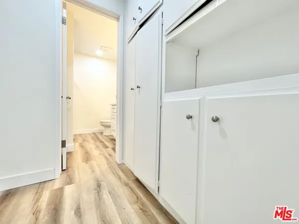 a view of a bathroom from a hallway