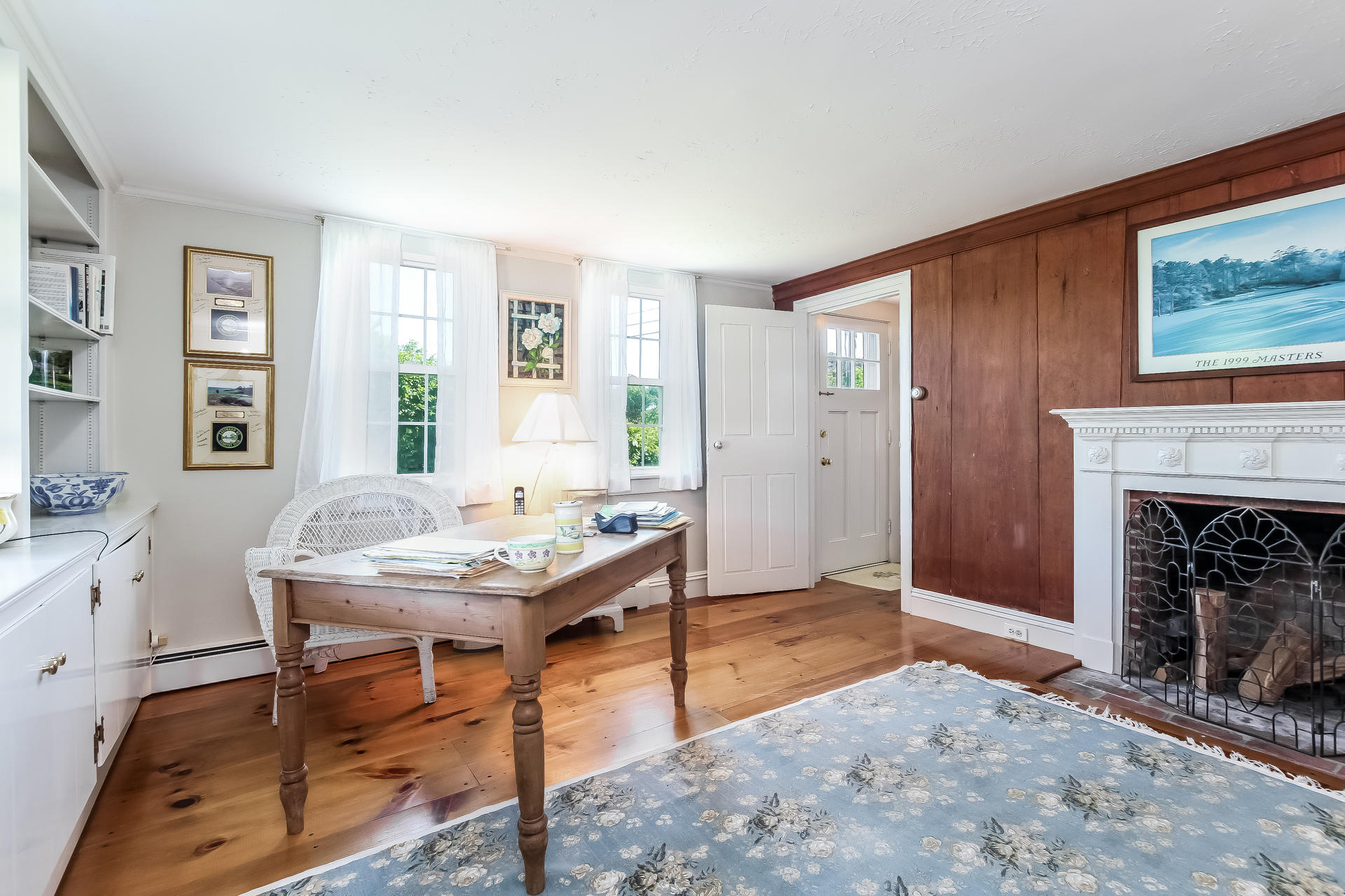 489 Stage Harbor Road Chatham, MA 02633 - Photo 10 of 34 a view of a livingroom with furniture and a fireplace