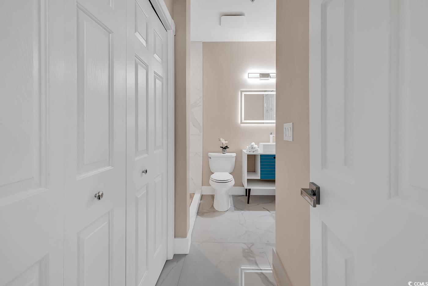 4821 Luster Leaf Circle, Unit 101 Myrtle Beach, SC 29577 - Photo 23 of 40 Bathroom featuring vanity and toilet