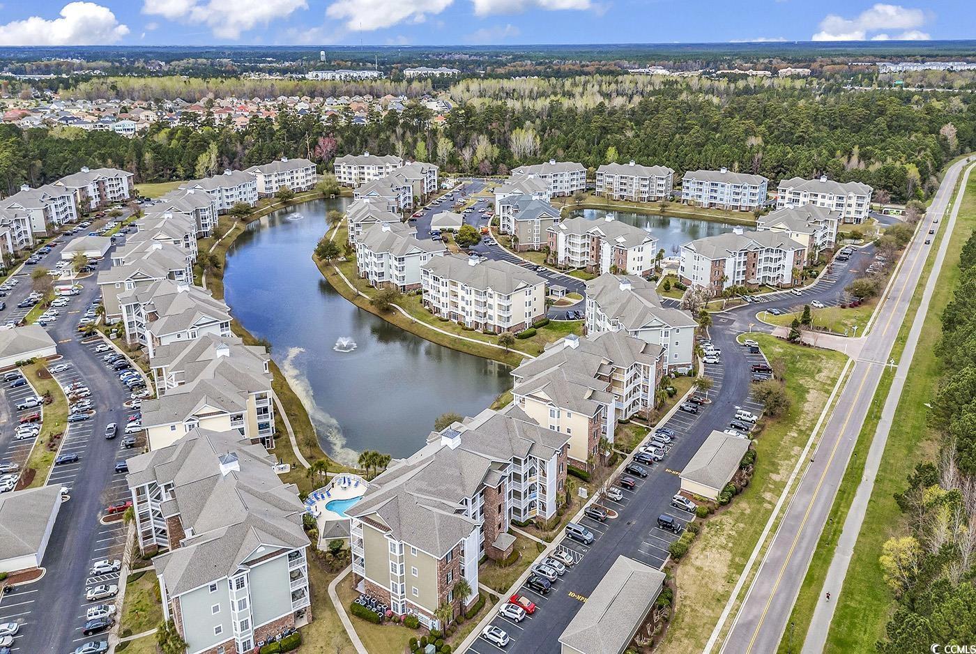 4821 Luster Leaf Circle, Unit 101 Myrtle Beach, SC 29577 - Photo 30 of 40 Drone / aerial view featuring a water view