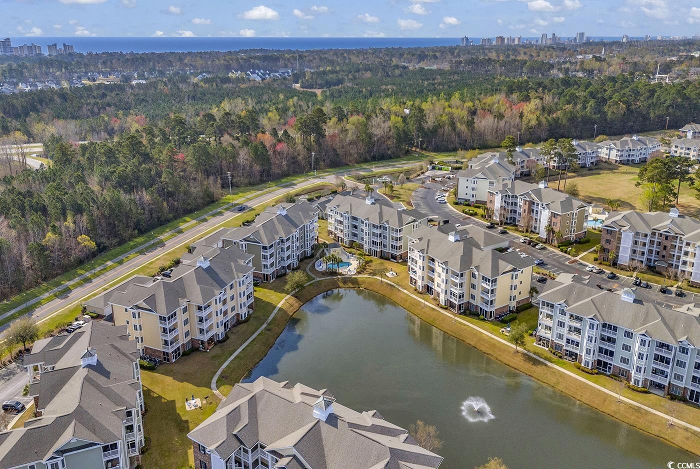 4821 Luster Leaf Circle, Unit 101 Myrtle Beach, SC 29577 - Photo 31 of 40 Drone / aerial view with a water view
