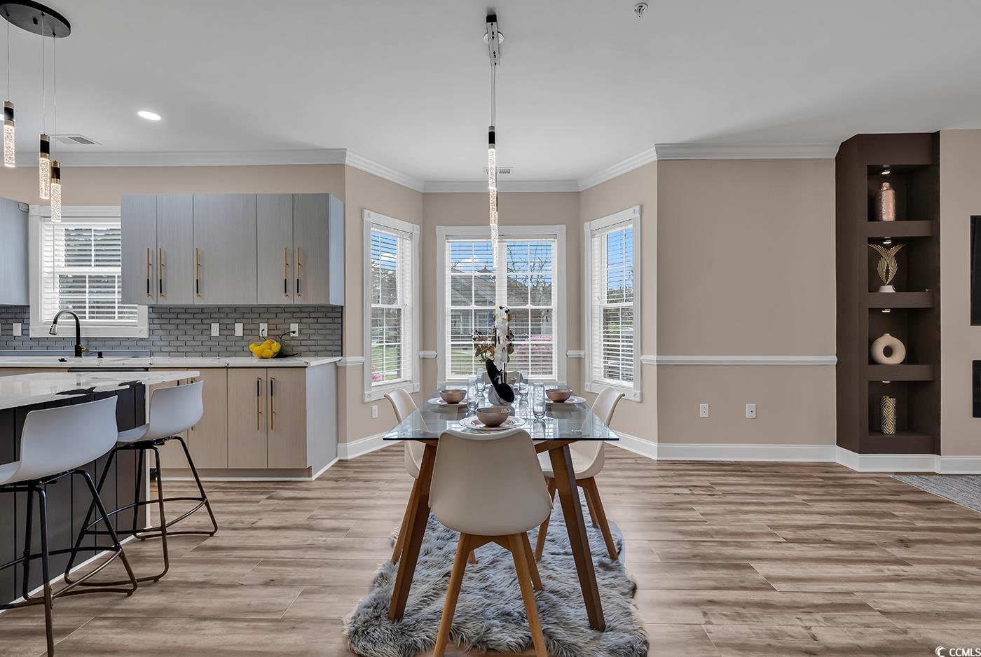 4821 Luster Leaf Circle, Unit 101 Myrtle Beach, SC 29577 - Photo 8 of 40 Interior space featuring pendant lighting, light h