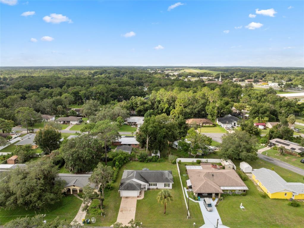 1221 Emerson Street Inverness, FL 34450 - Photo 2 of 39 an aerial view of residential houses with outdoor space