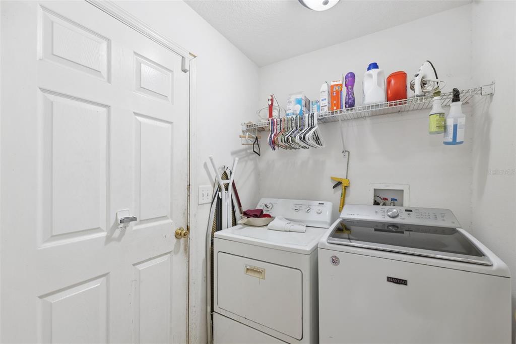 1221 Emerson Street Inverness, FL 34450 - Photo 24 of 39 a utility room with sink dryer and washer