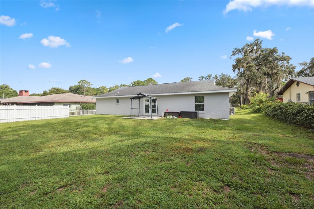 1221 Emerson Street Inverness, FL 34450 - Photo 26 of 39 a front view of house with yard and seating