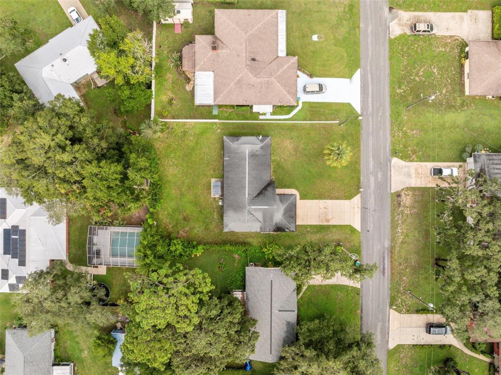 1221 Emerson Street Inverness, FL 34450 - Photo 35 of 39 an aerial view of a house with a yard basket ball court and outdoor seating