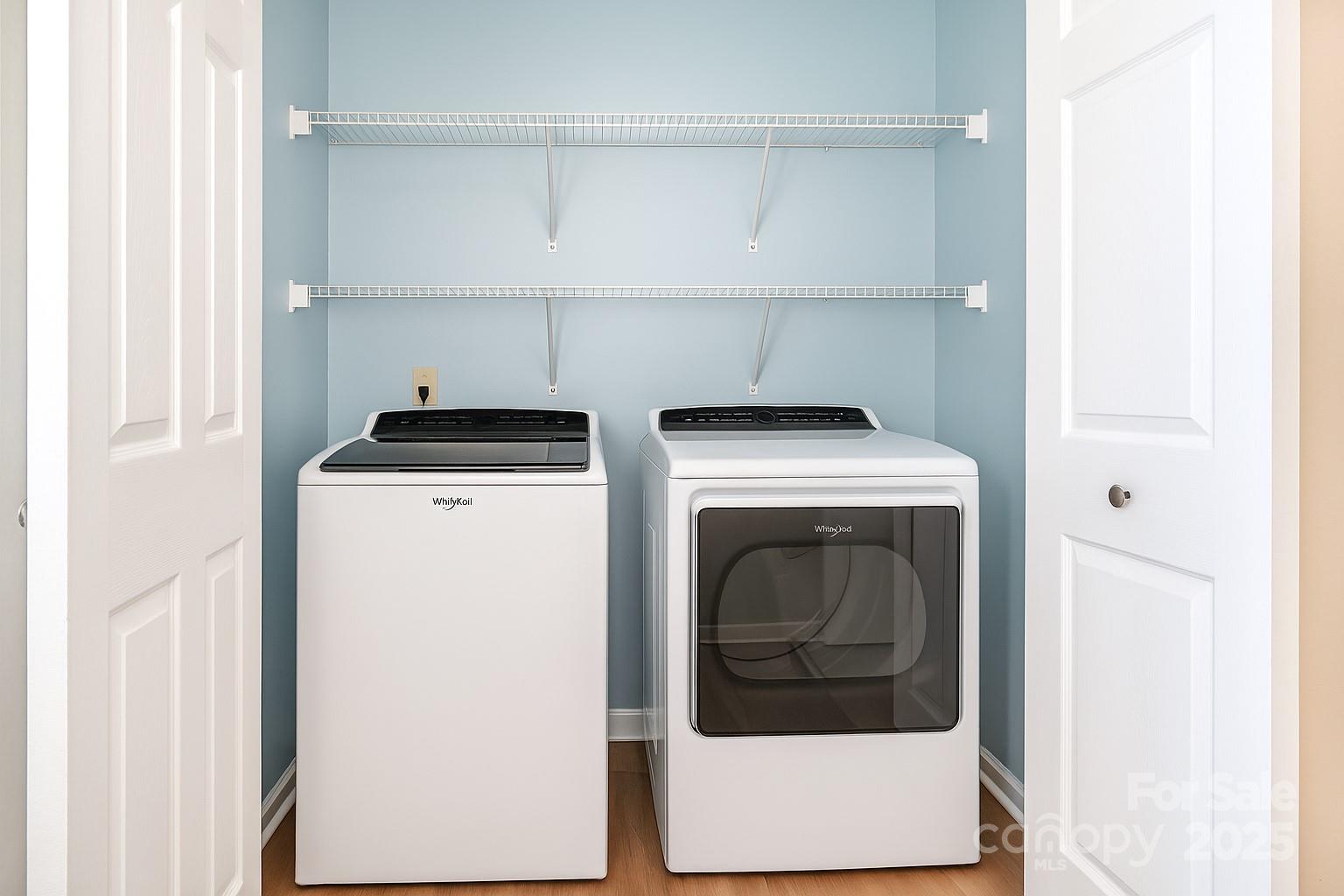 245 Castle Keep Road Salisbury, NC 28146 - Photo 12 of 26 a utility room with dryer and washer