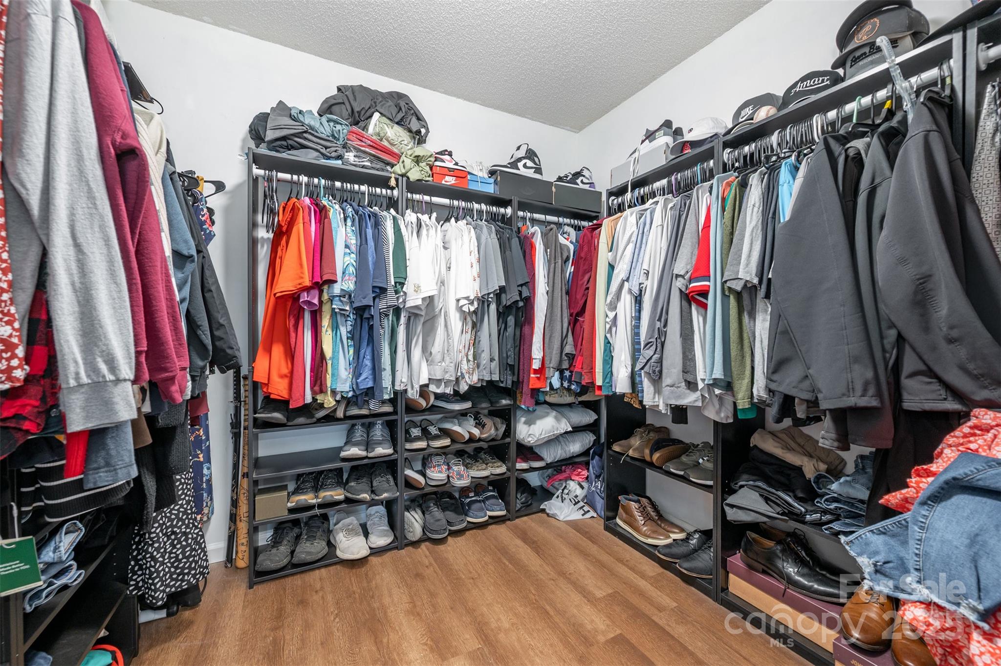 245 Castle Keep Road Salisbury, NC 28146 - Photo 15 of 26 a view of walk in closet with clothes