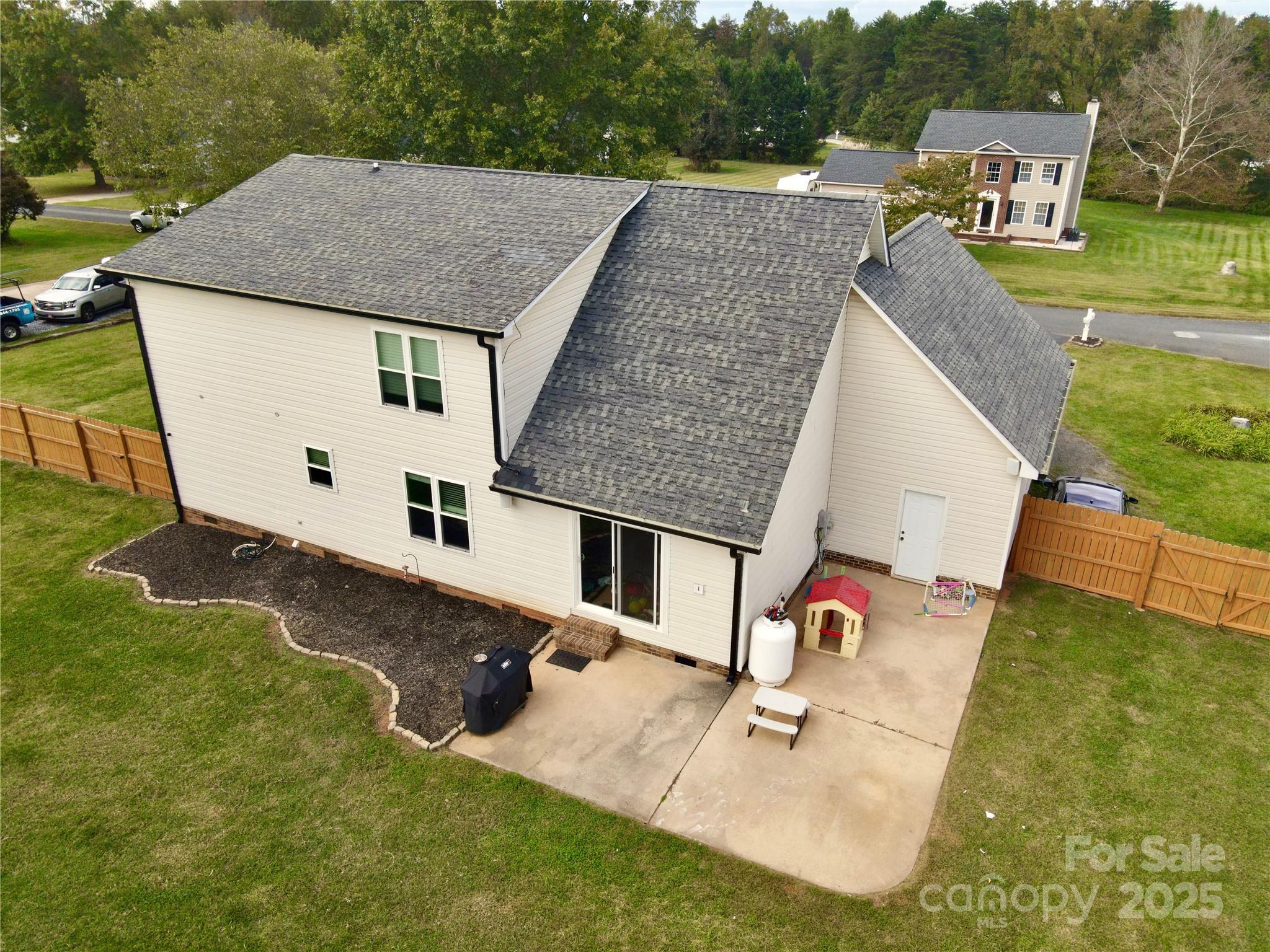 245 Castle Keep Road Salisbury, NC 28146 - Photo 22 of 26 an aerial view of a house with swimming pool and big yard