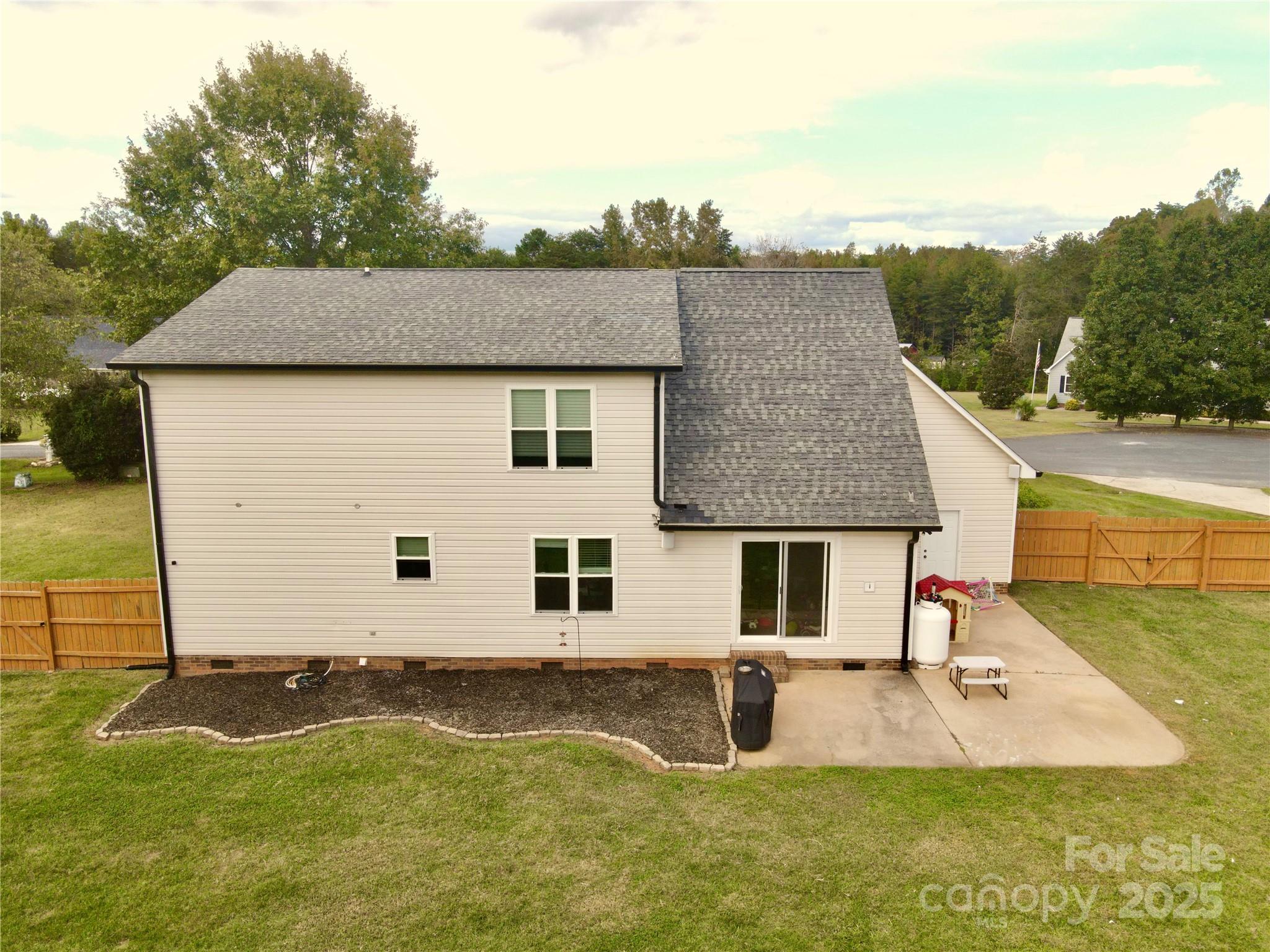 245 Castle Keep Road Salisbury, NC 28146 - Photo 23 of 26 a view of a house with pool and a yard