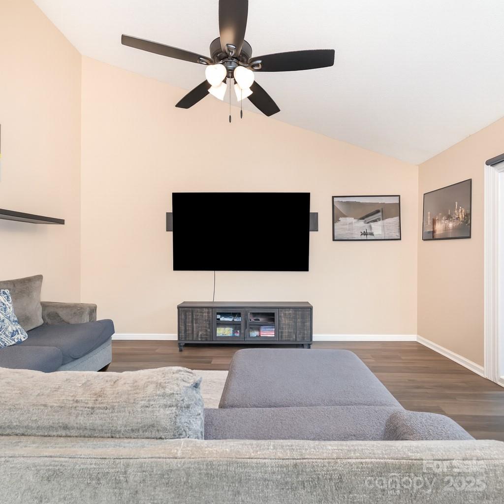 245 Castle Keep Road Salisbury, NC 28146 - Photo 8 of 26 a living room with furniture and a flat screen tv
