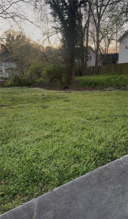 1102 Sims Street Southwest Atlanta, GA 30310 - Photo 3 of 6 a view of a yard with trees