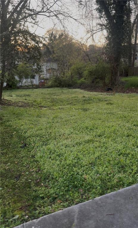 1102 Sims Street Southwest Atlanta, GA 30310 - Photo 5 of 6 a view of outdoor space with trees all around