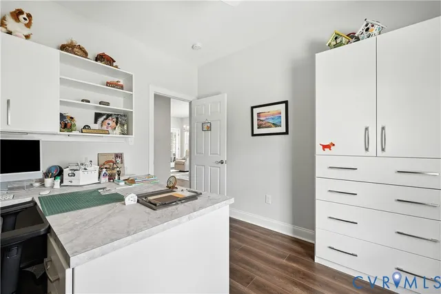 a workspace with furniture and window