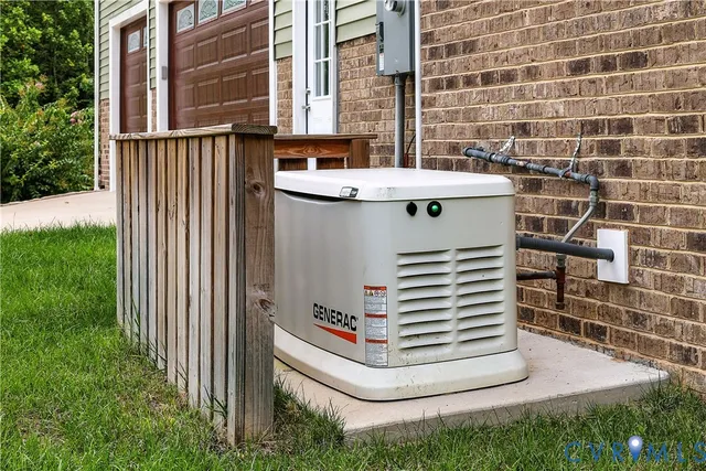 a white building with a sink and windows