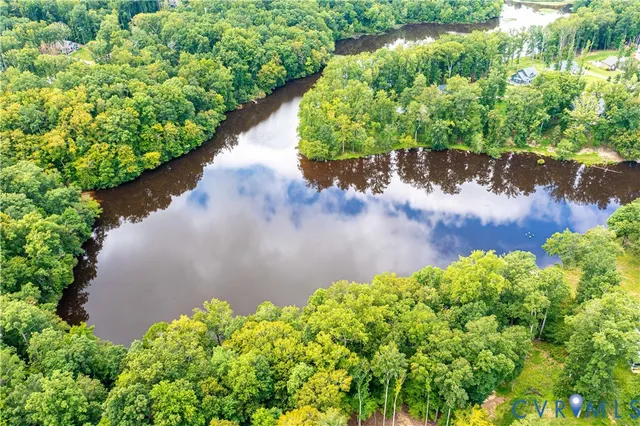 a view of a garden with a lake