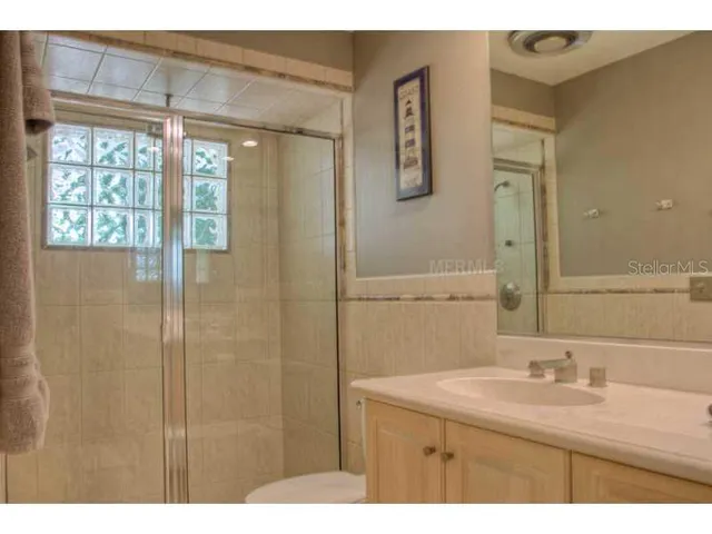 a view of a backyard with sitting area