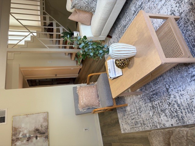 6910 Hart Lane, Unit 807 Austin, TX 78731 - Photo 19 of 36 view of living room with furniture and a potted plant