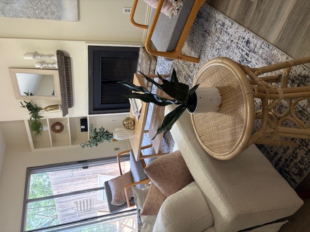 6910 Hart Lane, Unit 807 Austin, TX 78731 - Photo 20 of 36 a living room with furniture and a fireplace