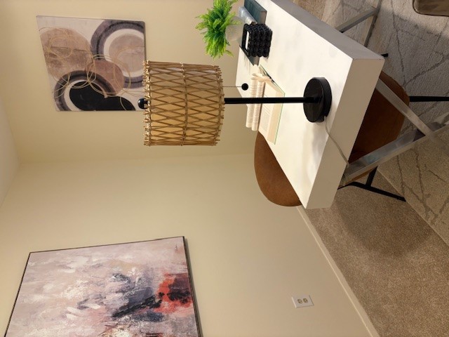 6910 Hart Lane, Unit 807 Austin, TX 78731 - Photo 22 of 36 a table with a vase and flowers on it