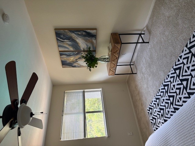 6910 Hart Lane, Unit 807 Austin, TX 78731 - Photo 27 of 36 a bedroom with a bed and a window
