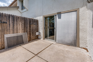 6910 Hart Lane, Unit 807 Austin, TX 78731 - Photo 7 of 36 a view of a door and wooden fence