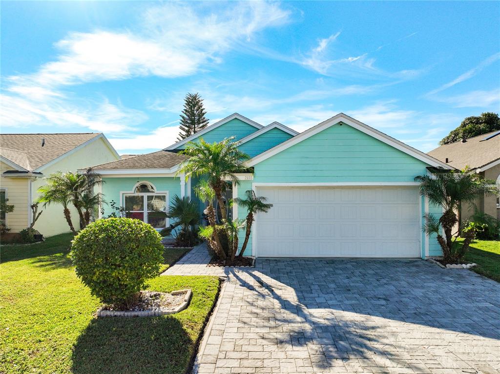 a view of a house with patio outdoor seating