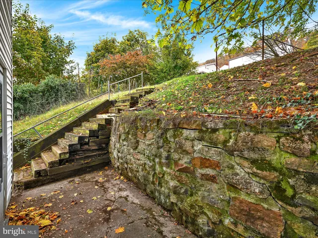 a view of mountain with wooden stairs