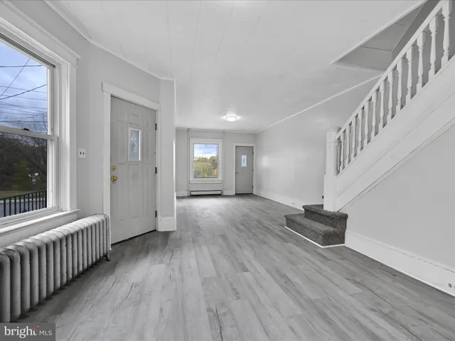 a view of livingroom with hardwood and furniture