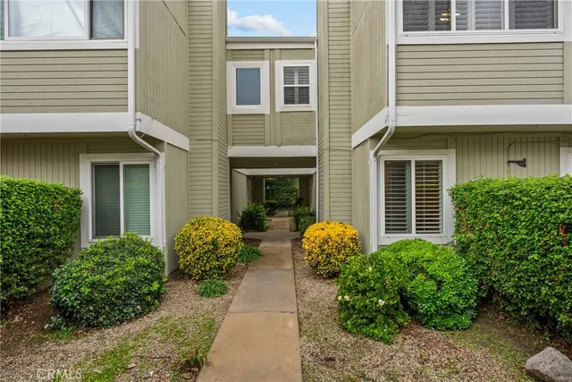 a bathroom with a shower toilet and sink