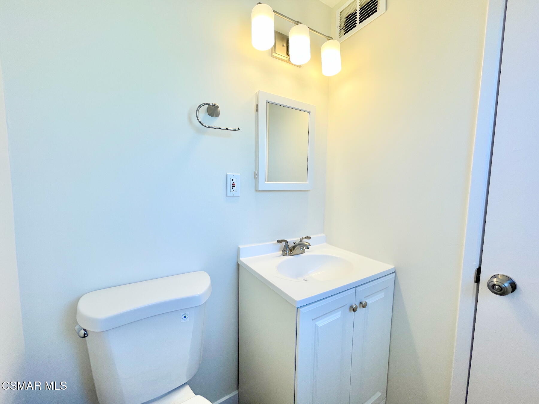 1240 Graham Street Simi Valley, CA 93065 - Photo 8 of 22 a bathroom with a sink a toilet and mirror