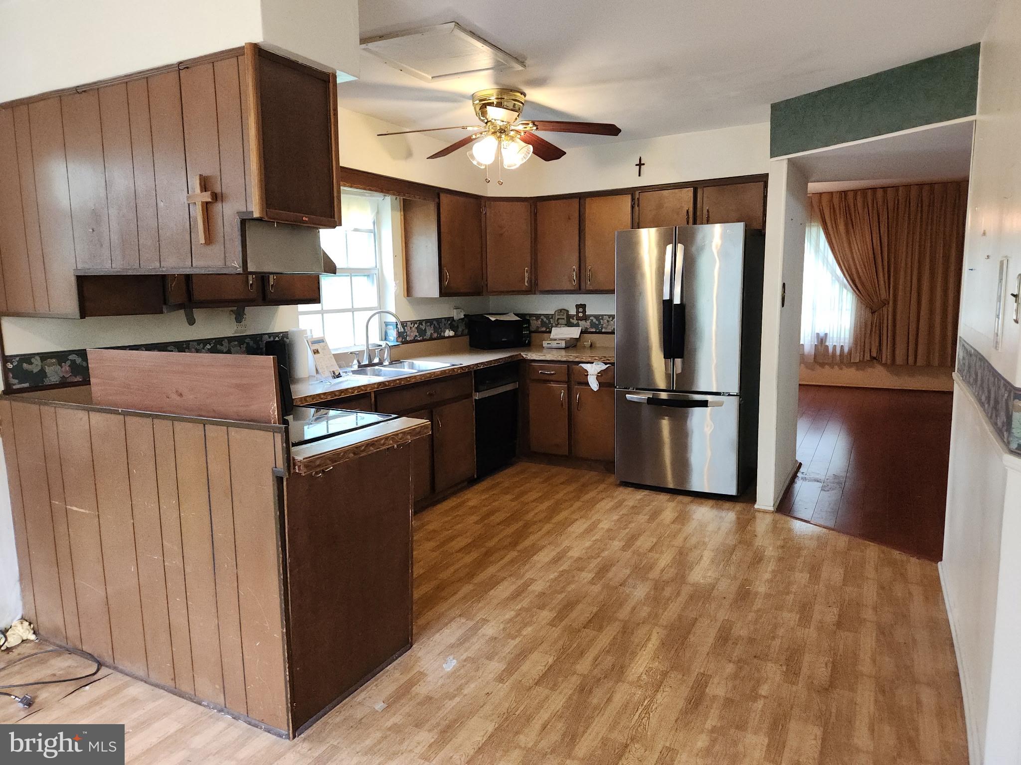 7 Ridge Road Malvern, PA 19355 - Photo 5 of 16 a kitchen with stainless steel appliances granite countertop a refrigerator a sink dishwasher a stove and a refrigerator