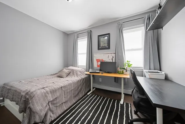 a bed room with a bed and a table